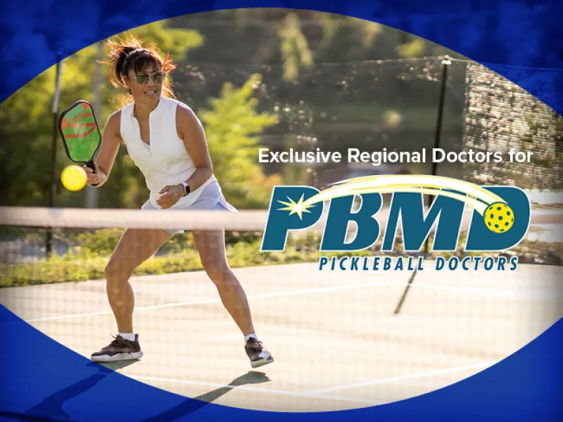 woman playing pickleball
