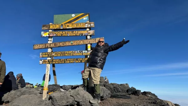 Patient Uday on top of Mt. Kilimanjaro 2 years after knee replacement